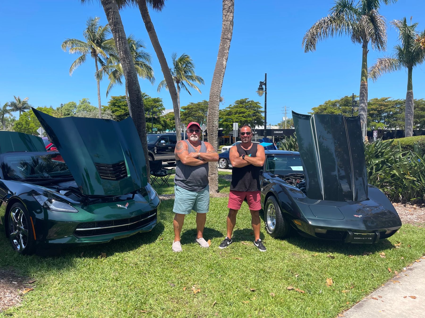 At a car show with a pair of Corvettes